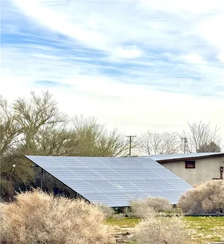 a view of a lake with a yard