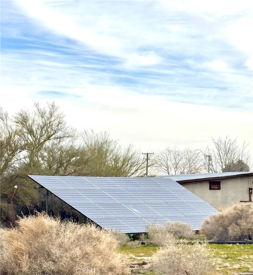 19859 Anahola Road Barstow, CA 92311 - Photo 6 of 6 a view of a lake with a yard