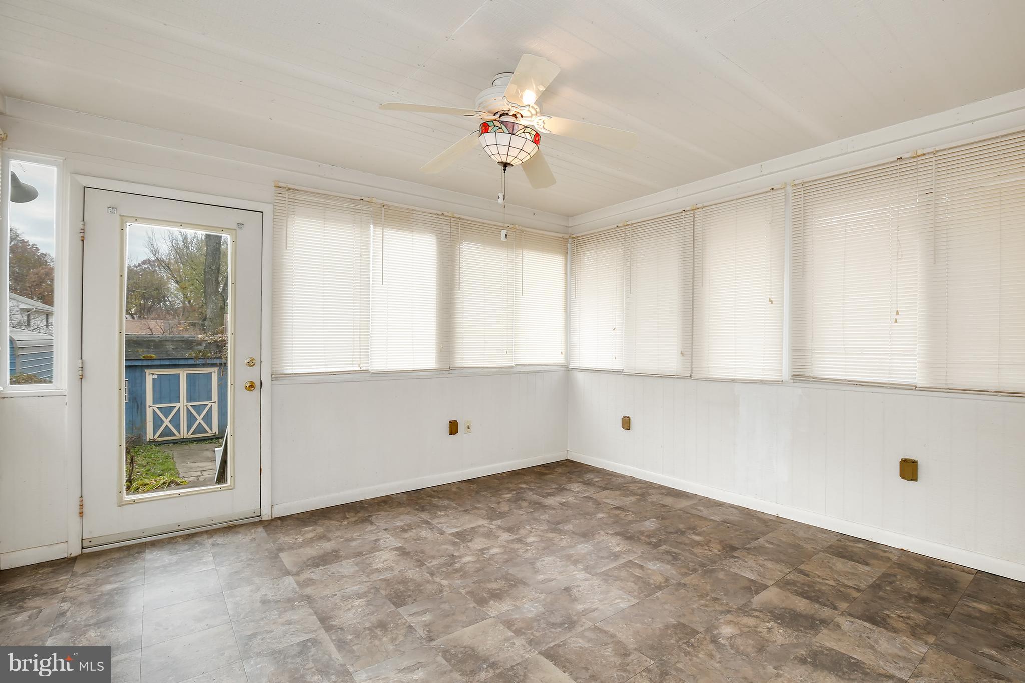 7515 Gresham Street Springfield, VA 22151 - Photo 12 of 36 a view of an empty room with a window