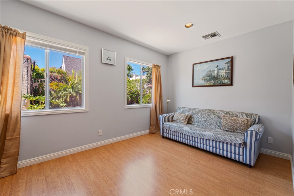 233 South Swall Drive Beverly Hills, CA 90211 - Photo 11 of 28 a living room with furniture and a window