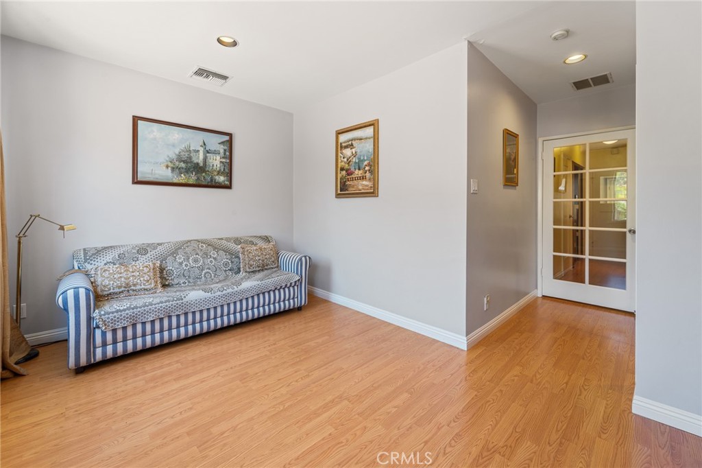 233 South Swall Drive Beverly Hills, CA 90211 - Photo 12 of 28 a living room with furniture and a window