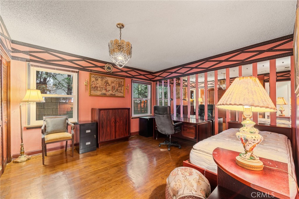 233 South Swall Drive Beverly Hills, CA 90211 - Photo 19 of 28 a very nice looking living room with a large window and furniture
