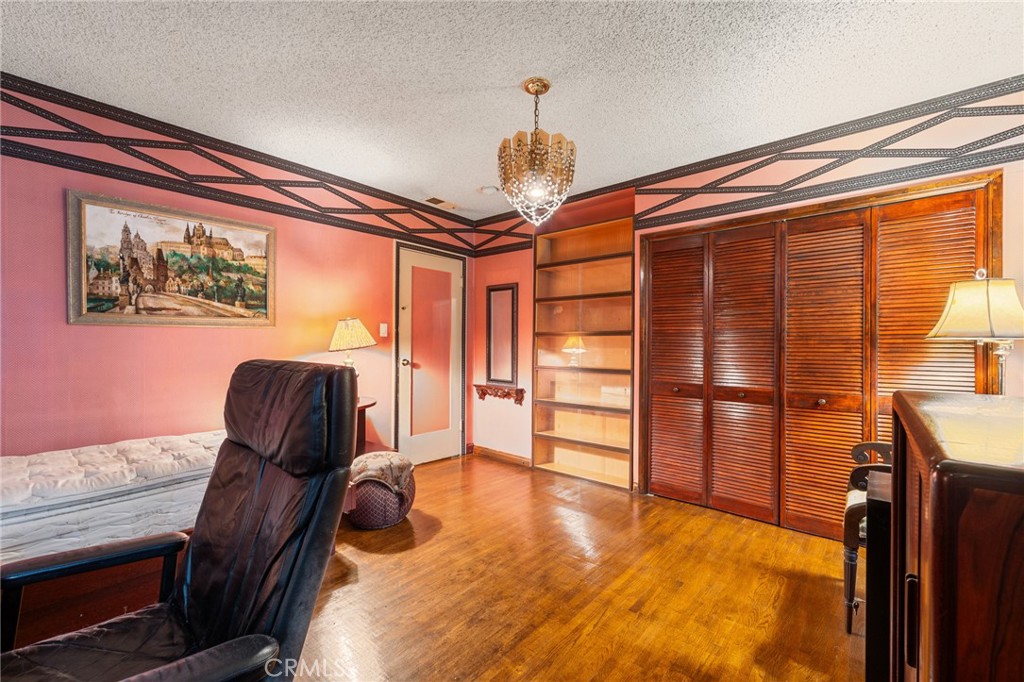 233 South Swall Drive Beverly Hills, CA 90211 - Photo 20 of 28 a view of a livingroom with furniture and staircase
