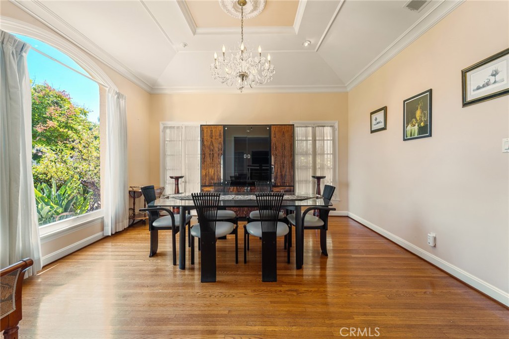 233 South Swall Drive Beverly Hills, CA 90211 - Photo 2 of 28 a view of a dining room with furniture window and wooden floor