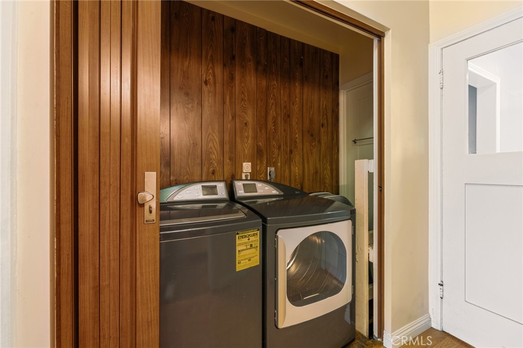 233 South Swall Drive Beverly Hills, CA 90211 - Photo 21 of 28 a utility room with dryer and washer