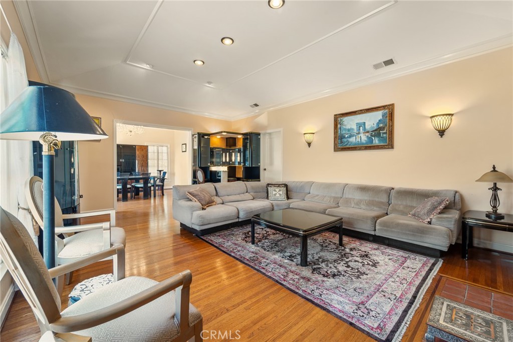 233 South Swall Drive Beverly Hills, CA 90211 - Photo 3 of 28 a living room with furniture and a rug