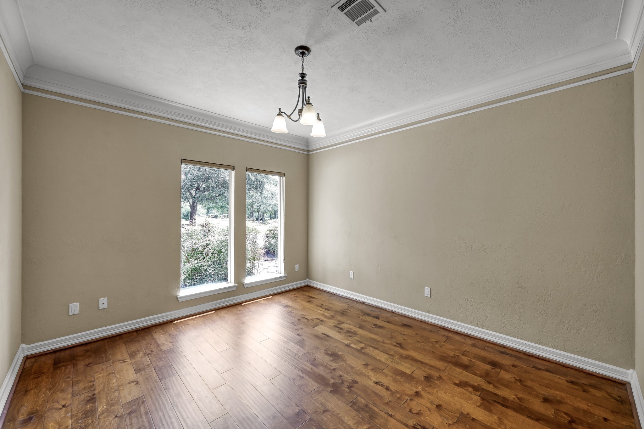 2205 Longmire Road Conroe, TX 77304 - Photo 17 of 49 Gorgeous crown molding throughout the home