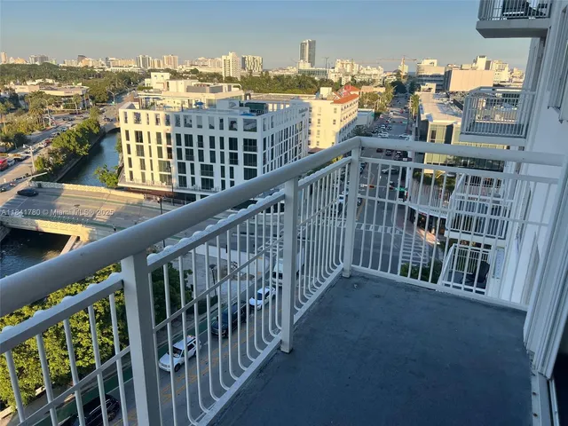 a view of buildings from a balcony
