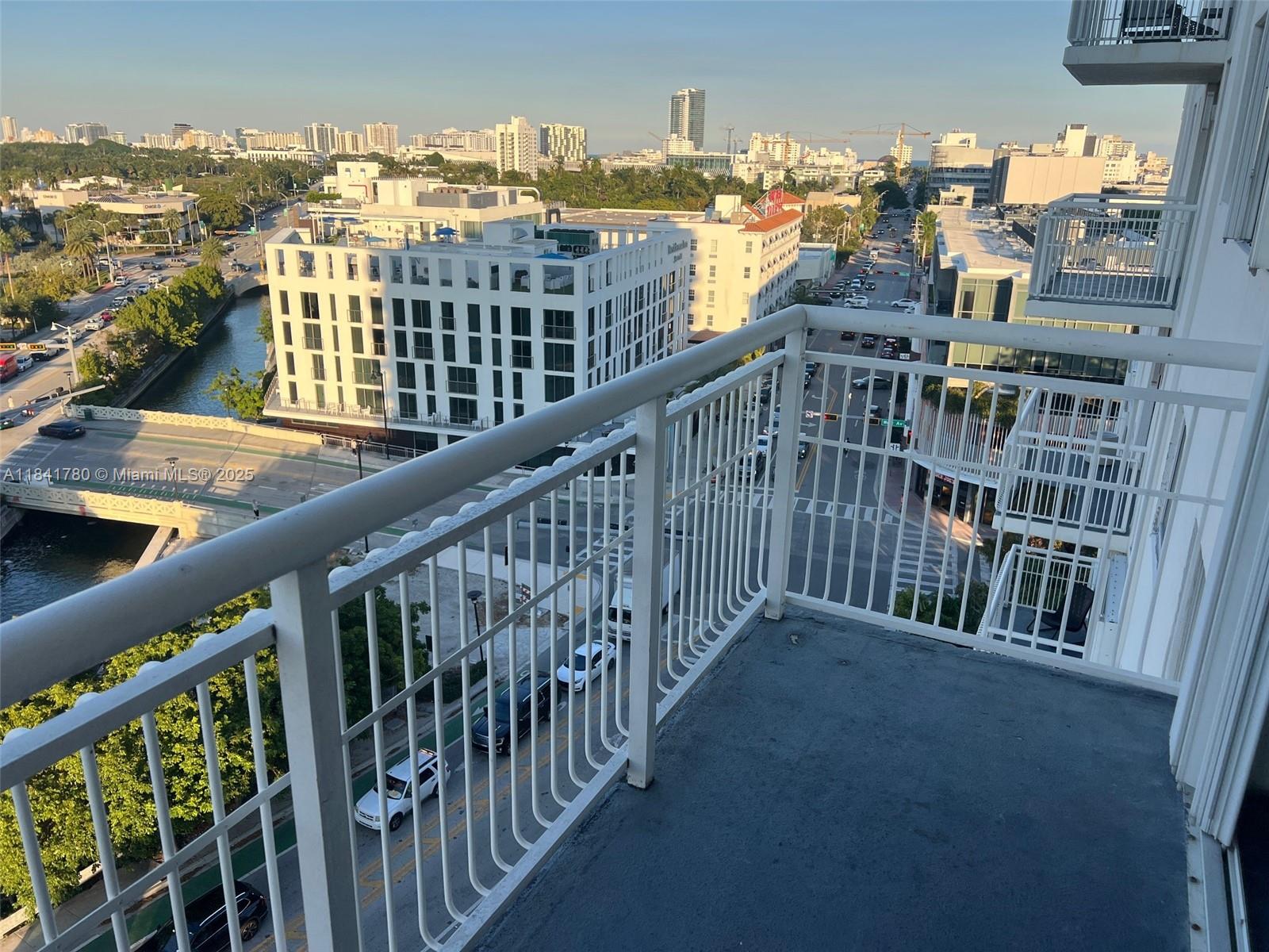 1688 West Avenue, Unit 1005 Miami Beach, FL 33139 - Photo 4 of 34 a view of buildings from a balcony