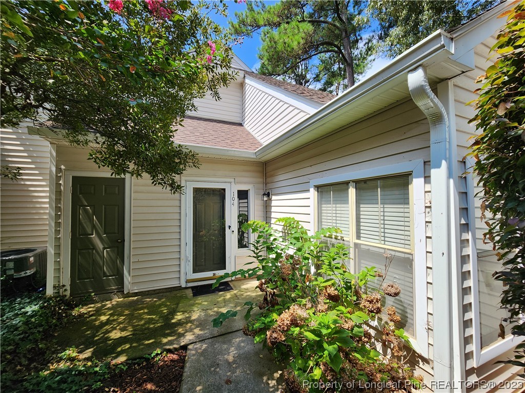a house with a flower garden