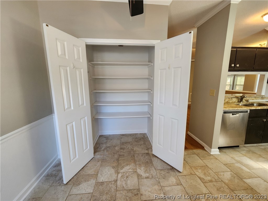6111 Sunpointe Drive, Unit 104 Raleigh, NC 27606 - Photo 16 of 49 a view of storage and utility room