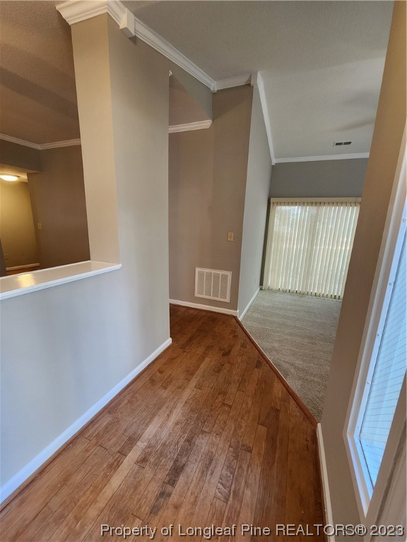 6111 Sunpointe Drive, Unit 104 Raleigh, NC 27606 - Photo 5 of 49 a view of empty room with wooden floor