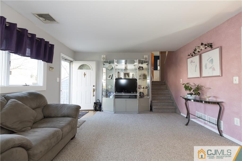 205 North Hill Road Colonia, NJ 07067 - Photo 3 of 25 a living room with furniture and window