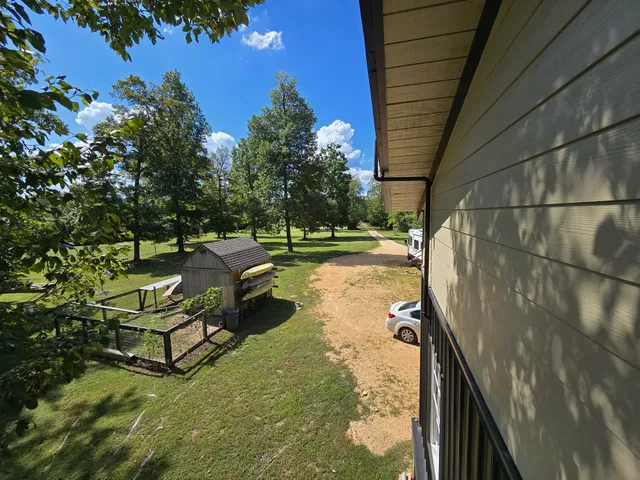 a view of swimming pool from a balcony