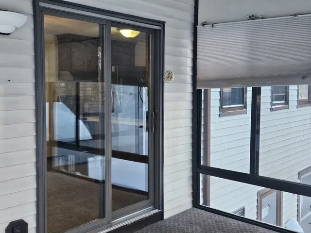 a view of a balcony from a door