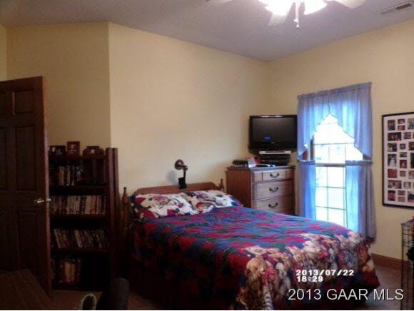 1400 Hermitage Road Waynesboro, VA 22980 - Photo 11 of 23 a bedroom with a bed and a television