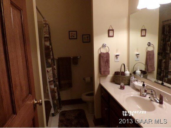 1400 Hermitage Road Waynesboro, VA 22980 - Photo 15 of 23 a bathroom with a sink vanity mirror and shower