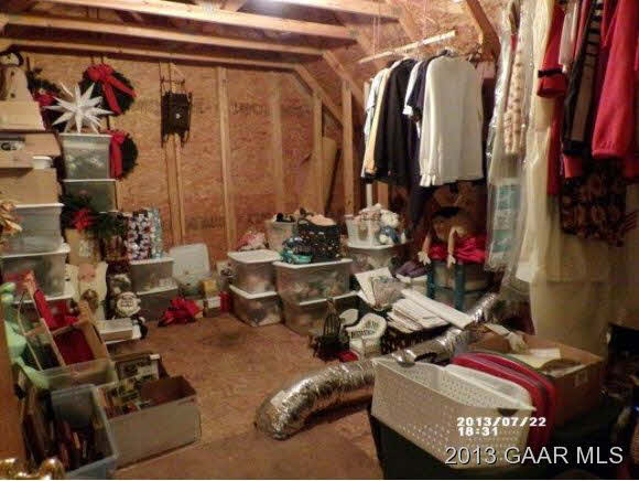 1400 Hermitage Road Waynesboro, VA 22980 - Photo 17 of 23 a view of walk in closet with clothes and shoes