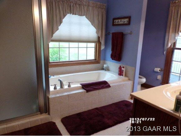 1400 Hermitage Road Waynesboro, VA 22980 - Photo 10 of 23 a bathroom with a bathtub and a window