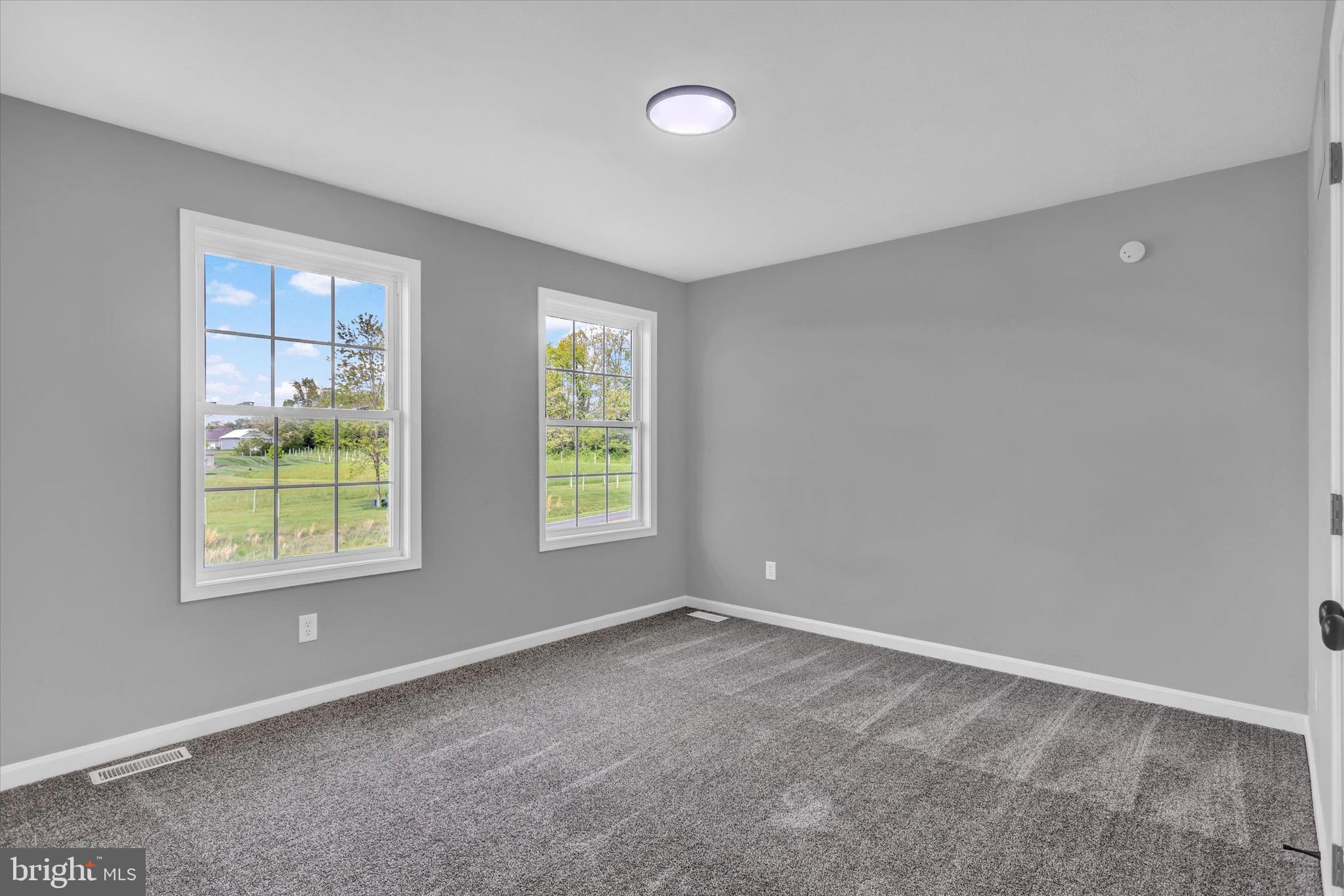 195 St Johns Road West Littlestown, PA 17340 - Photo 20 of 36 an empty room with windows