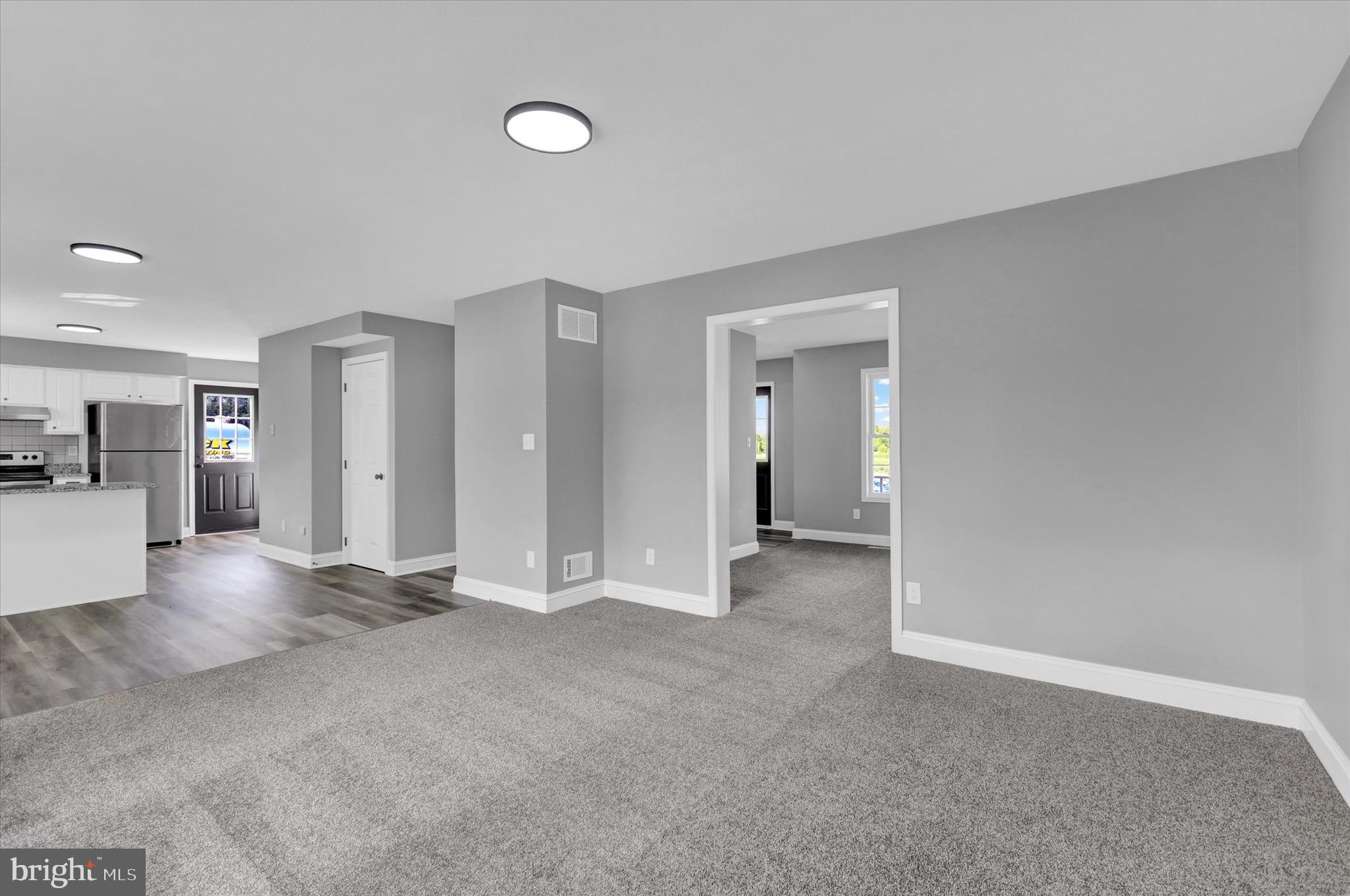 195 St Johns Road West Littlestown, PA 17340 - Photo 10 of 36 a view of a livingroom with a staircase