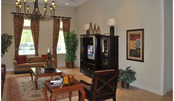 a living room with furniture and window