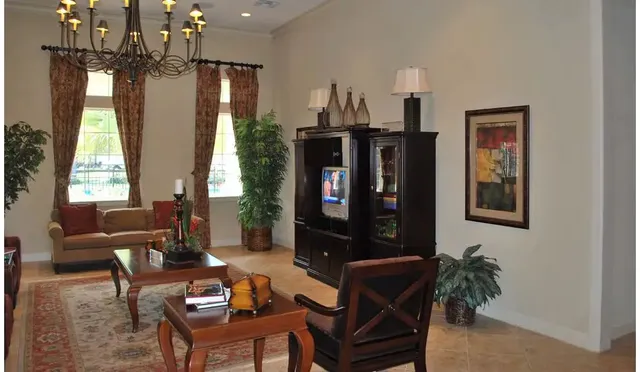 a living room with furniture and window