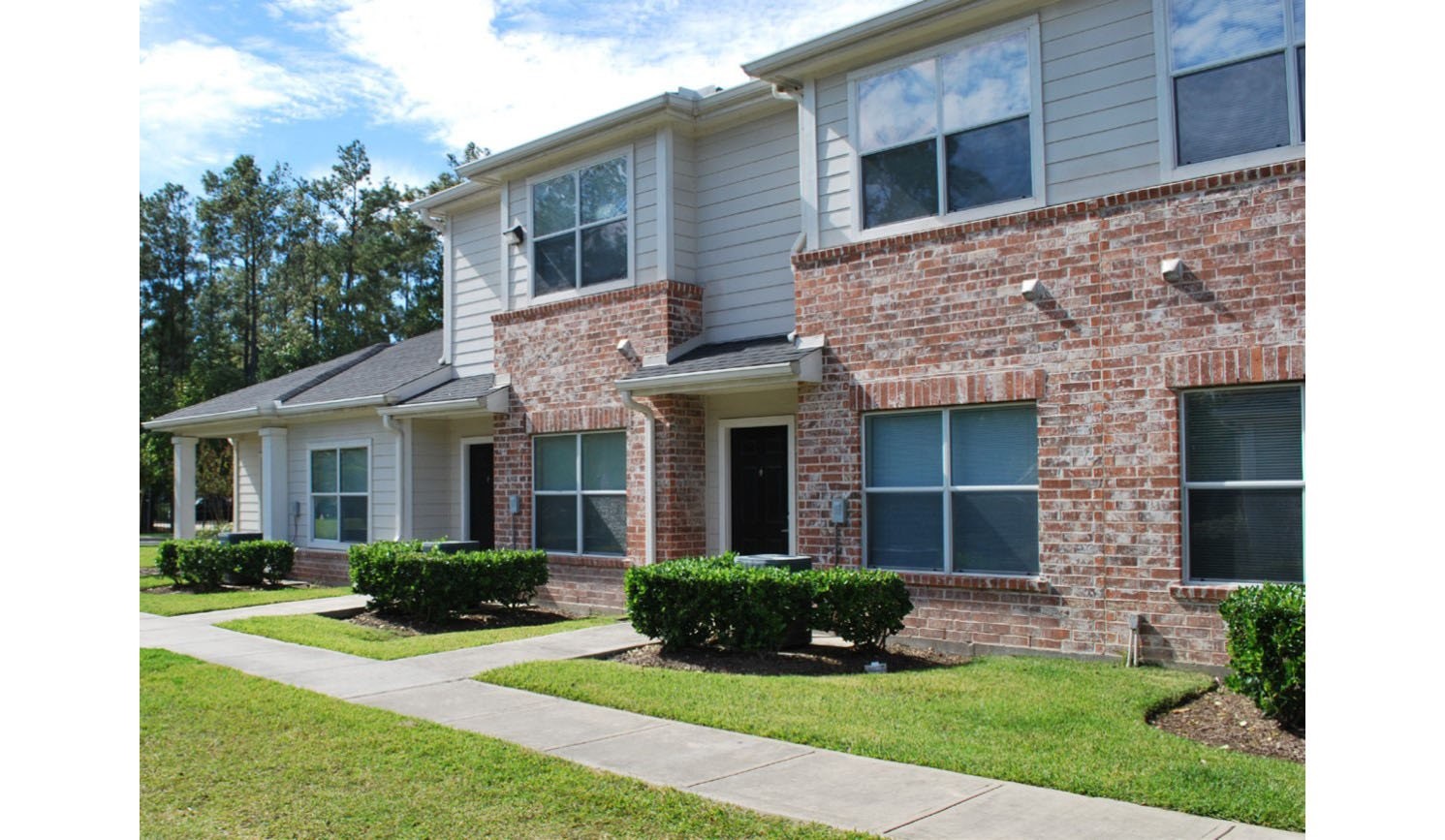 24011 Richards Road Spring, TX 77386 - Photo 2 of 14 a front view of a house with a yard