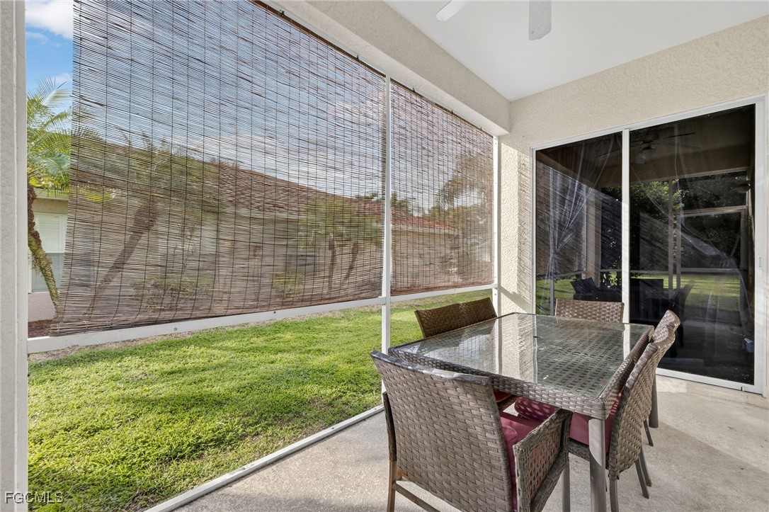 12899 Ivory Stone Loop Fort Myers, FL 33913 - Photo 25 of 40 a balcony with table and chairs