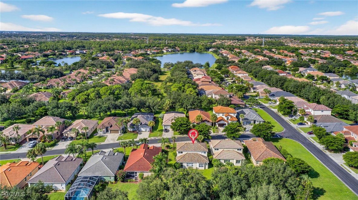 12899 Ivory Stone Loop Fort Myers, FL 33913 - Photo 30 of 40 an aerial view of house with yard swimming pool and outdoor seating