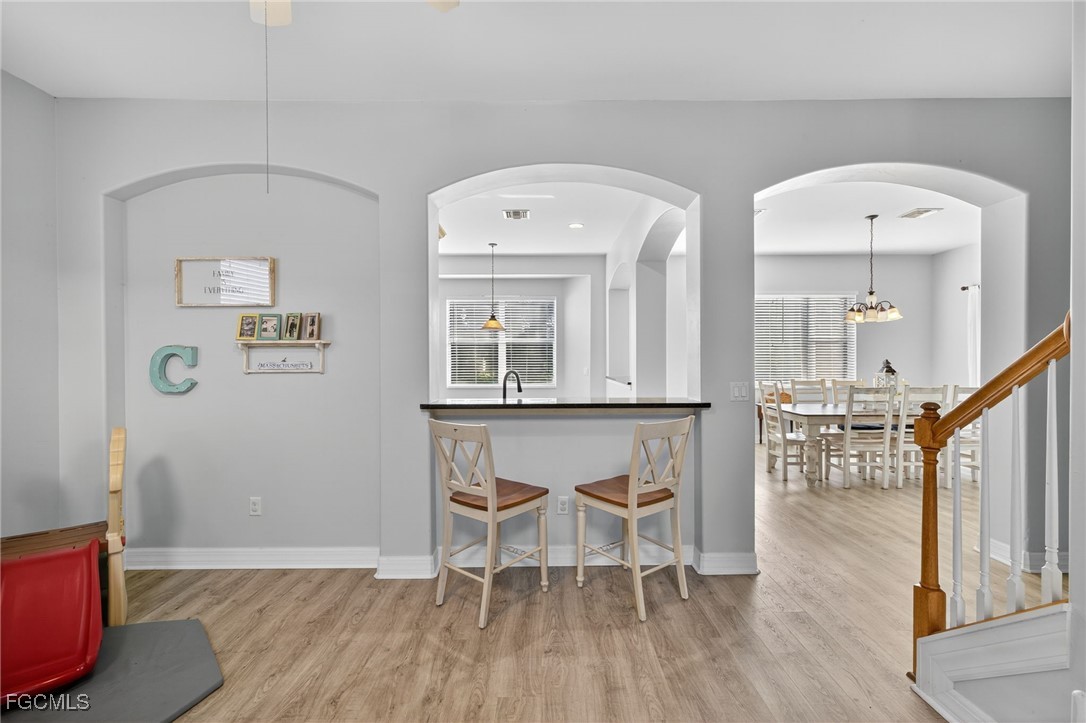 12899 Ivory Stone Loop Fort Myers, FL 33913 - Photo 6 of 40 a view of livingroom with furniture and wooden floor