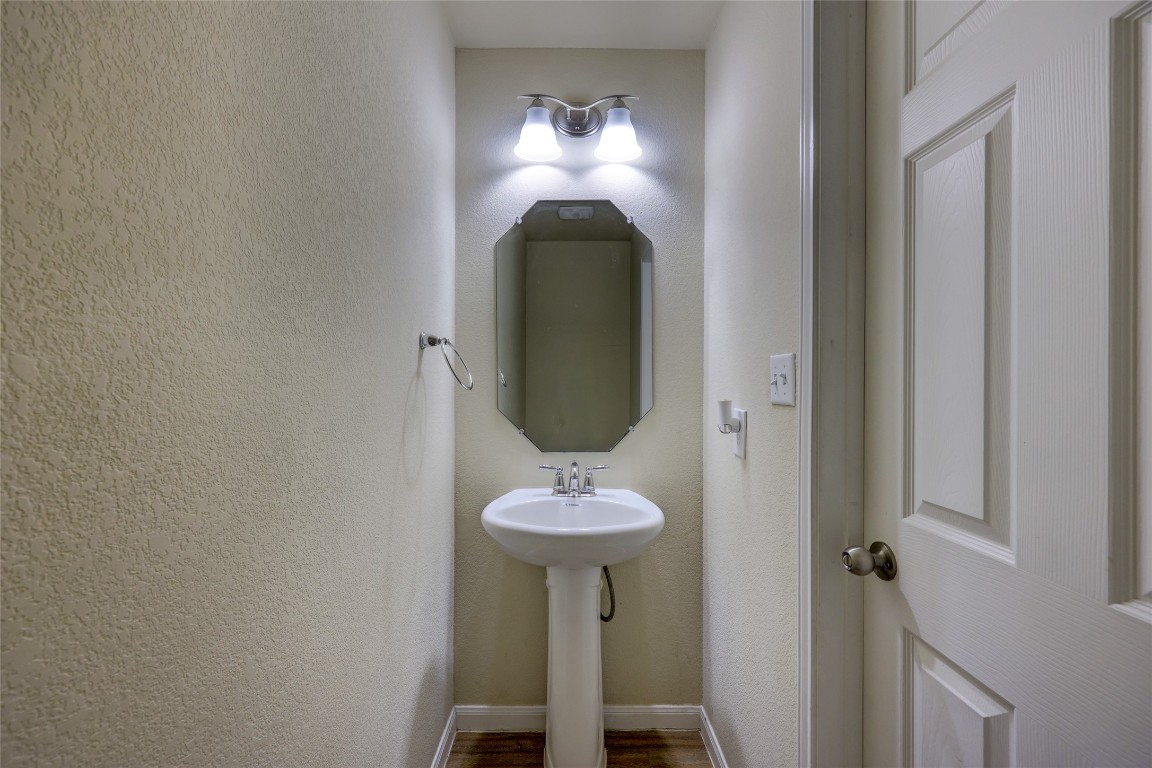 267 Voyager Cove Kyle, TX 78640 - Photo 17 of 40 Half bath downstairs