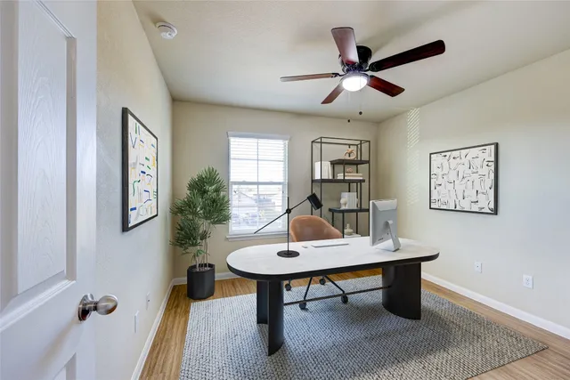 a spacious bedroom with a large bed and a window