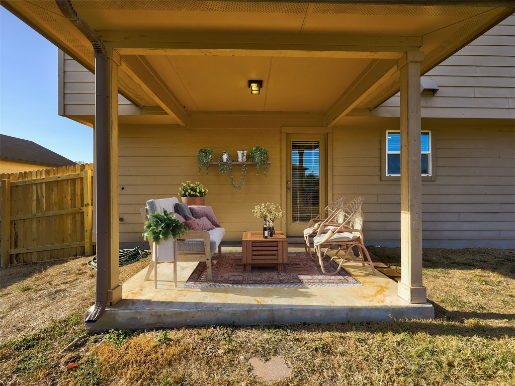 267 Voyager Cove Kyle, TX 78640 - Photo 8 of 40 Covered patio out back *pic virtually staged*
