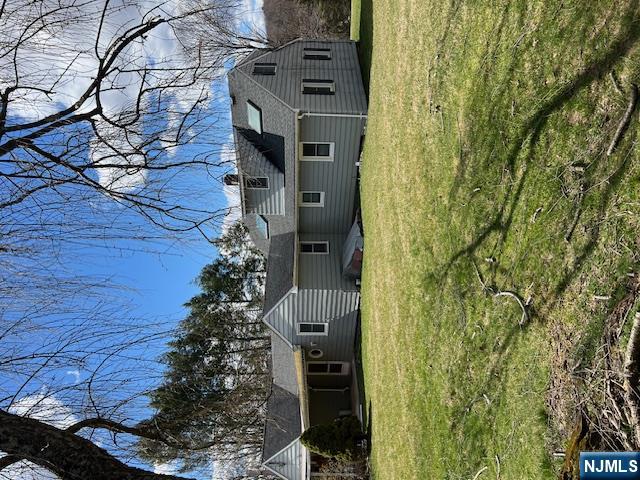 404 Stonetown Road Ringwood, NJ 07456 - Photo 13 of 13 a view of a house with a yard