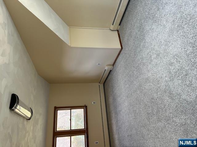 404 Stonetown Road Ringwood, NJ 07456 - Photo 5 of 13 an empty room with windows