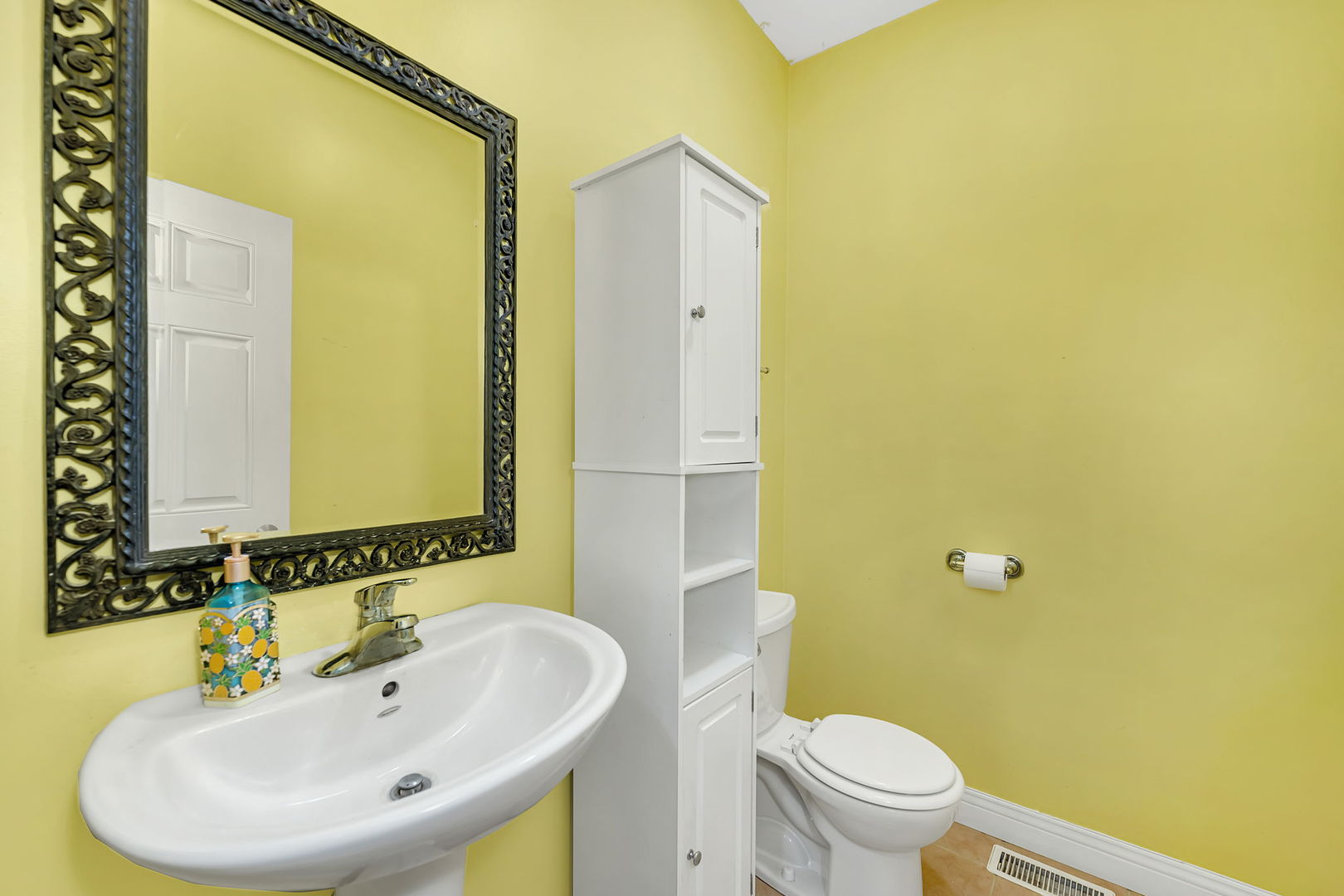 300 Village Lane Seneca, IL 61360 - Photo 21 of 42 a bathroom with a sink and a mirror