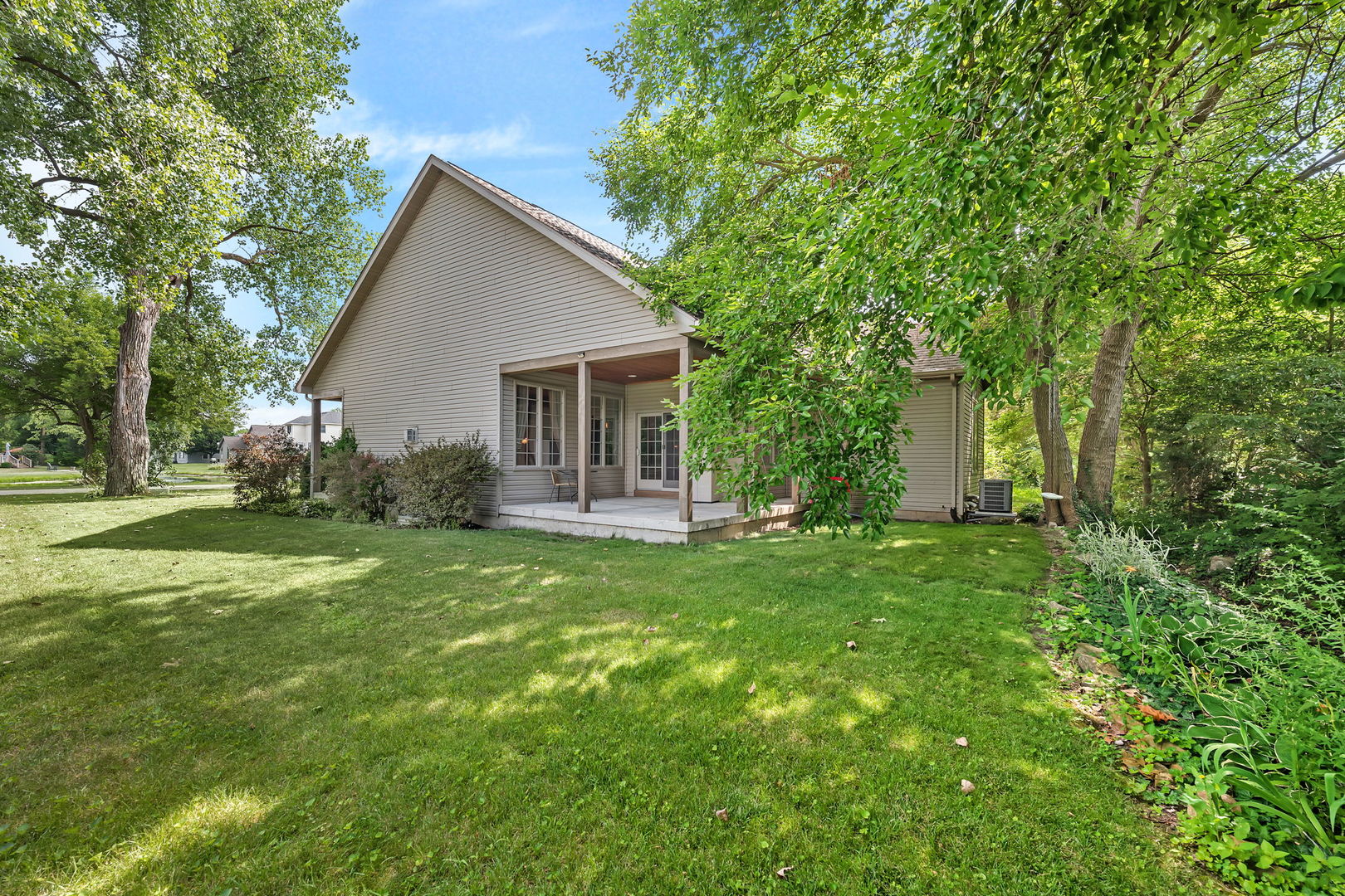 300 Village Lane Seneca, IL 61360 - Photo 34 of 42 a view of a house with backyard and garden