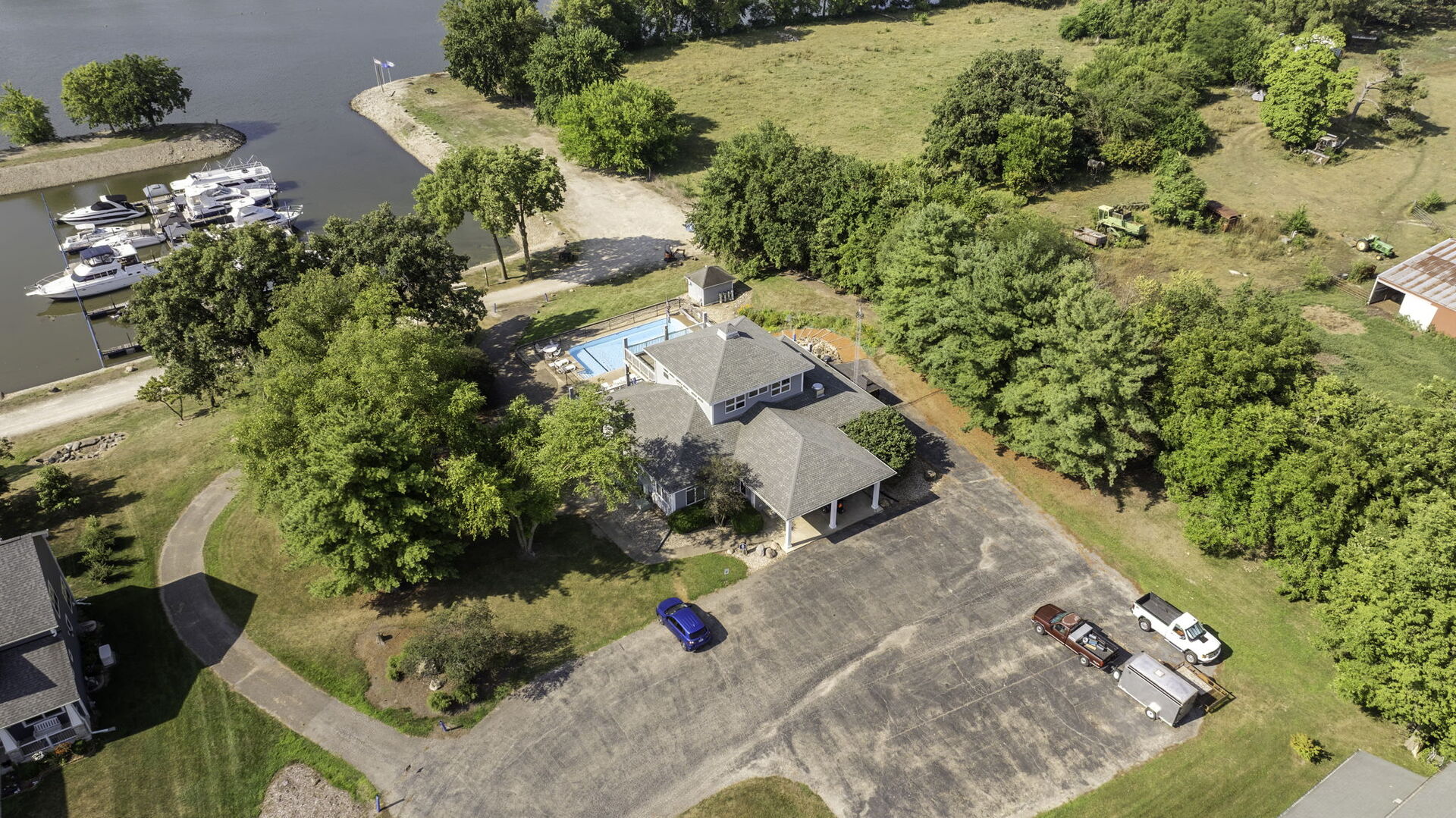 300 Village Lane Seneca, IL 61360 - Photo 38 of 42 an aerial view of a house with a yard and trees