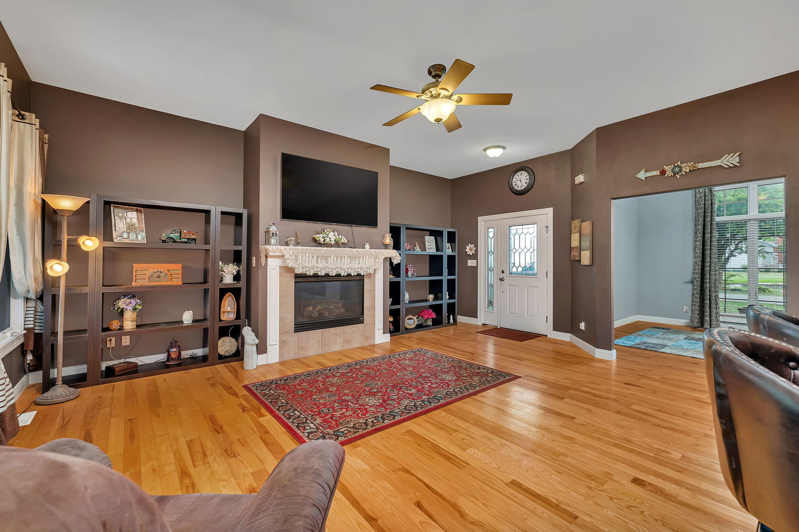 300 Village Lane Seneca, IL 61360 - Photo 7 of 42 a spacious bedroom with a bed and a flat screen tv