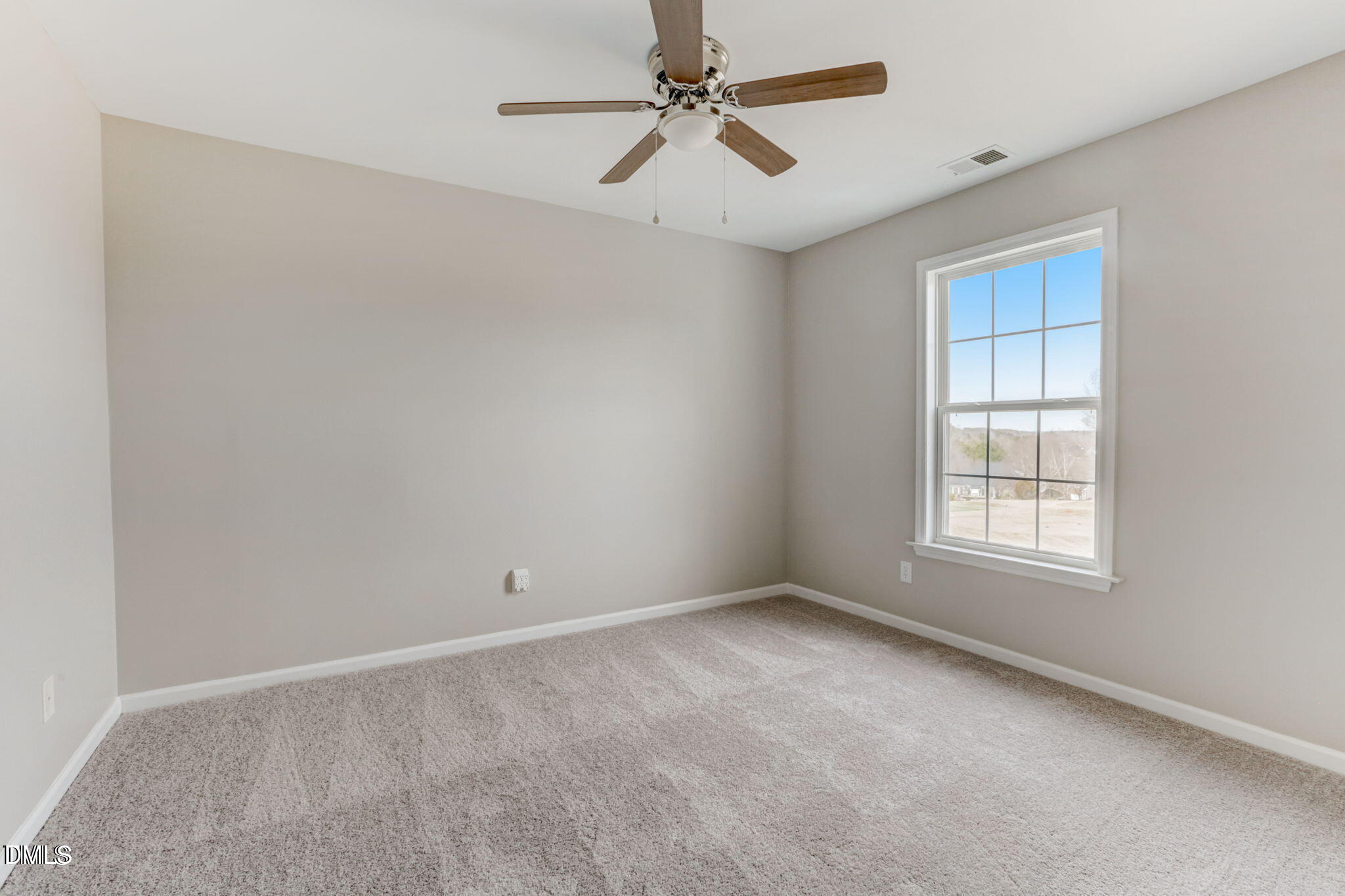 480 Seastone Street Raleigh, NC 27603 - Photo 22 of 26 a view of empty room with windows