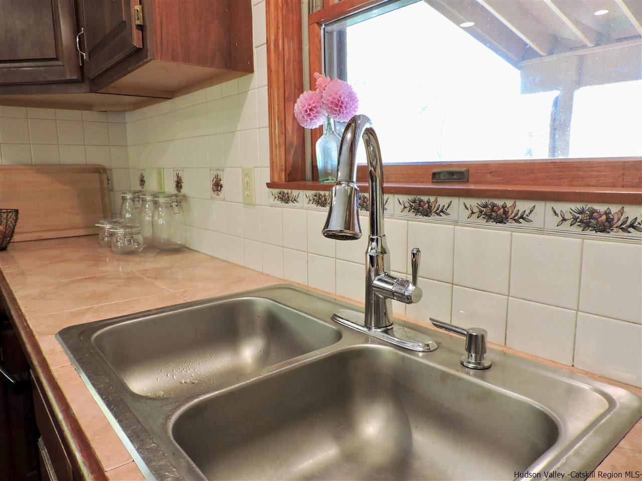 2579 Vega Mountain Road Roxbury, NY 12421 - Photo 12 of 34 a close view of sink and tap
