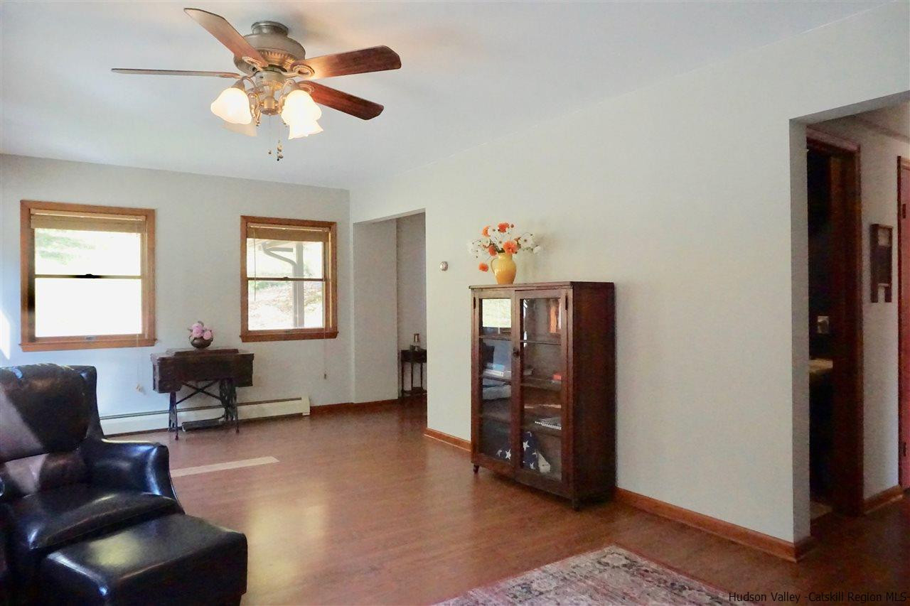 2579 Vega Mountain Road Roxbury, NY 12421 - Photo 16 of 34 a living room with furniture and a window