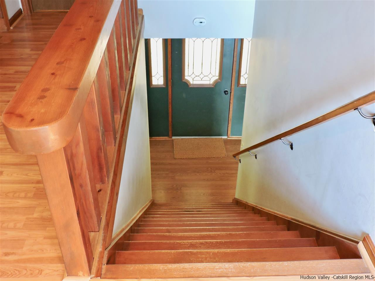 2579 Vega Mountain Road Roxbury, NY 12421 - Photo 20 of 34 a view of a hallway with wooden floor and stairs