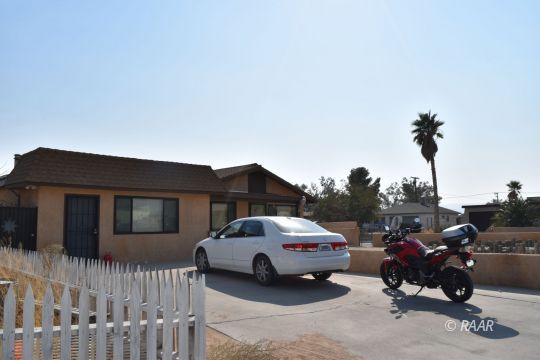 424 South Gordon Street Ridgecrest, CA 93555 - Photo 2 of 6 a view of a car park in front of house