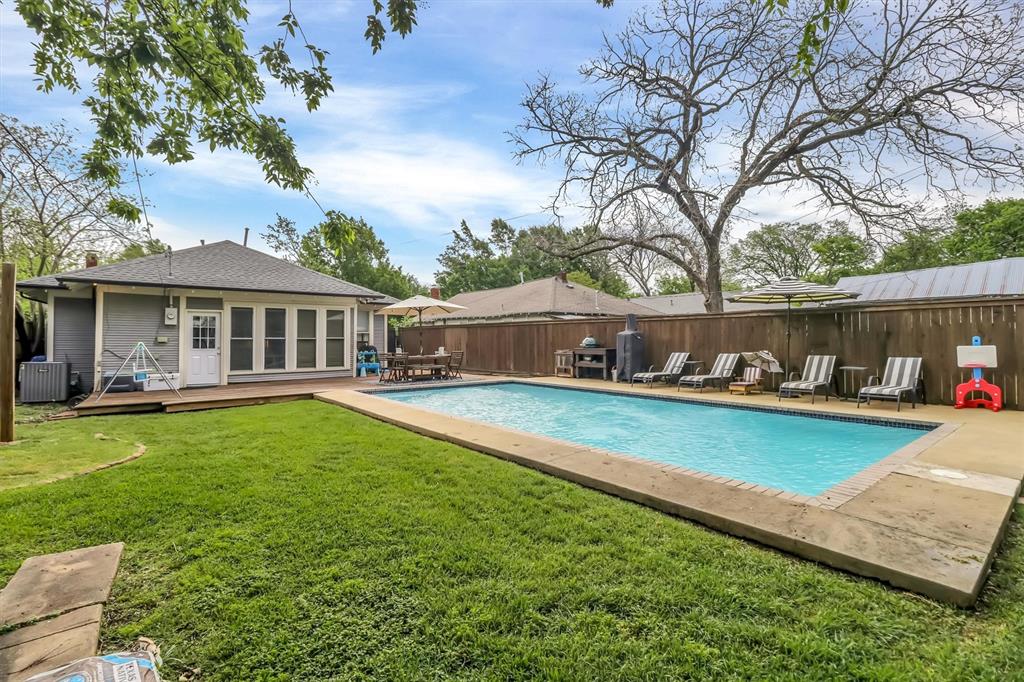 307 North Edgefield Avenue Dallas, TX 75208 - Photo 28 of 28 a front view of a house with swimming pool having outdoor seating