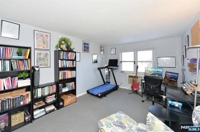 a view of a workspace with furniture and toys