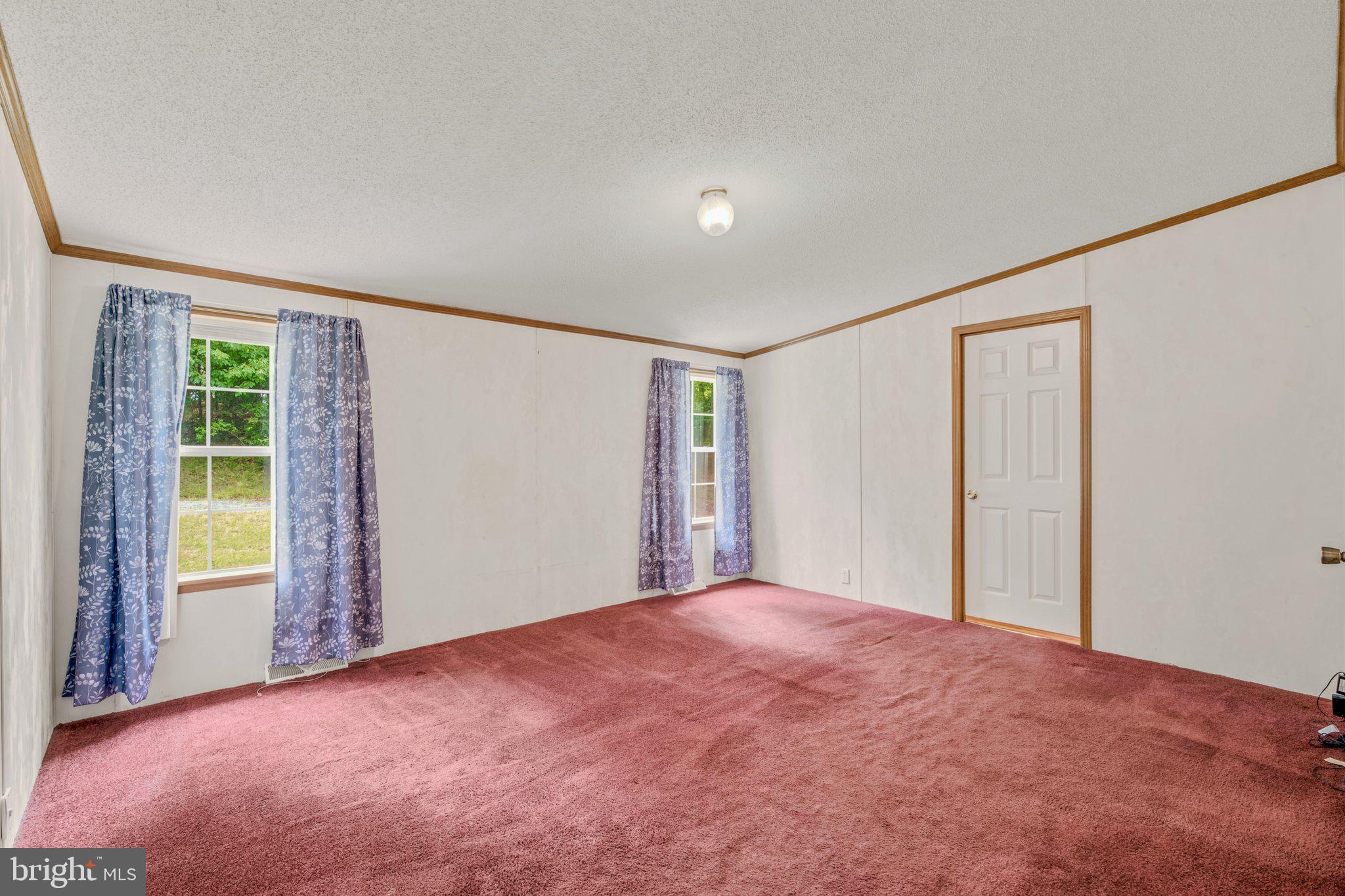 193 Co Rte 9/15 Berkeley Springs, WV 25411 - Photo 14 of 32 Primary Bedroom