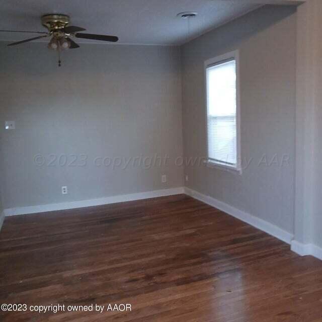 1408 Southwest 12th Avenue Amarillo, TX 79102 - Photo 20 of 25 wooden floor in an empty room with a window