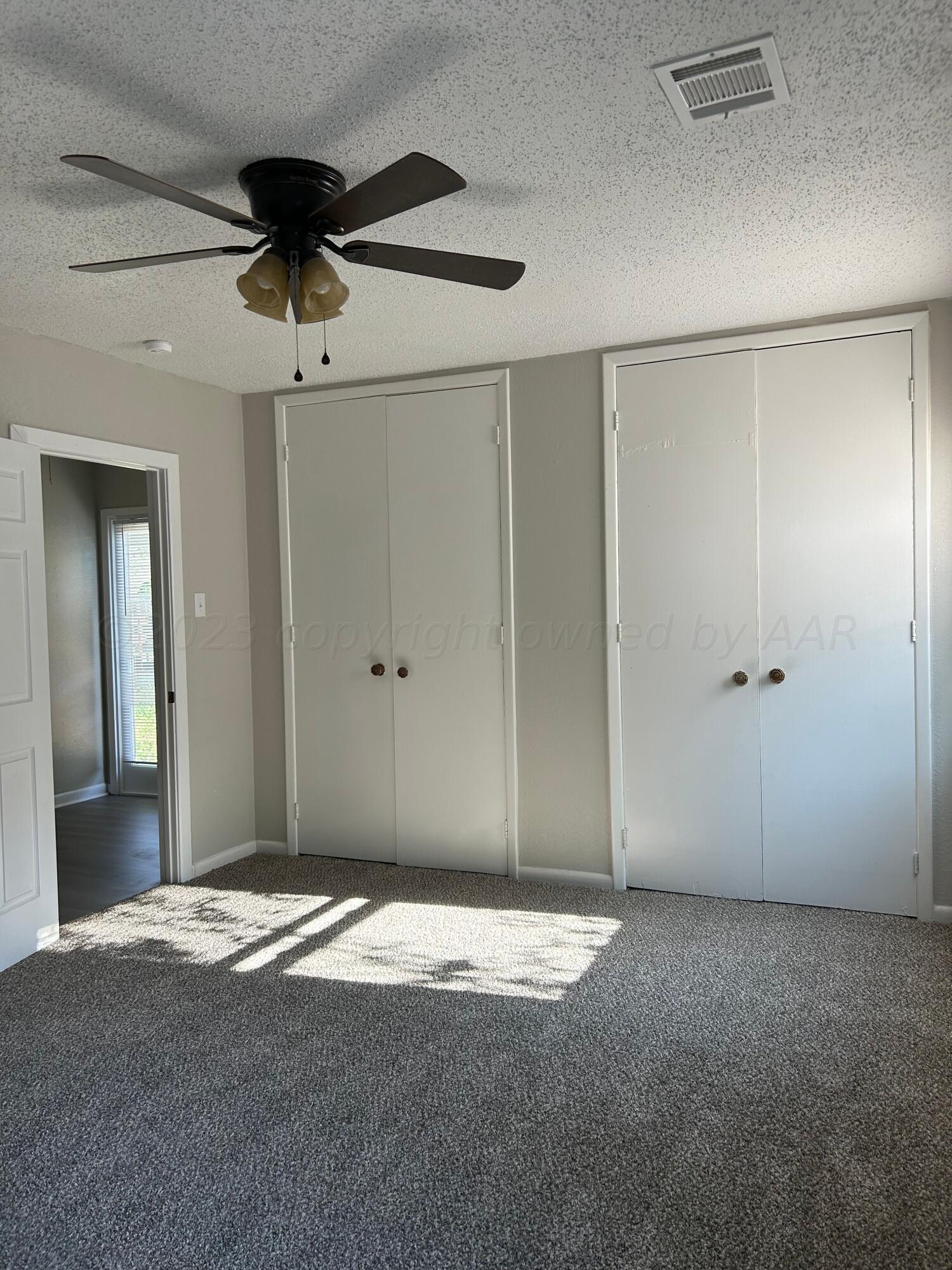 1408 Southwest 12th Avenue Amarillo, TX 79102 - Photo 23 of 25 a view of a livingroom with a chandelier fan